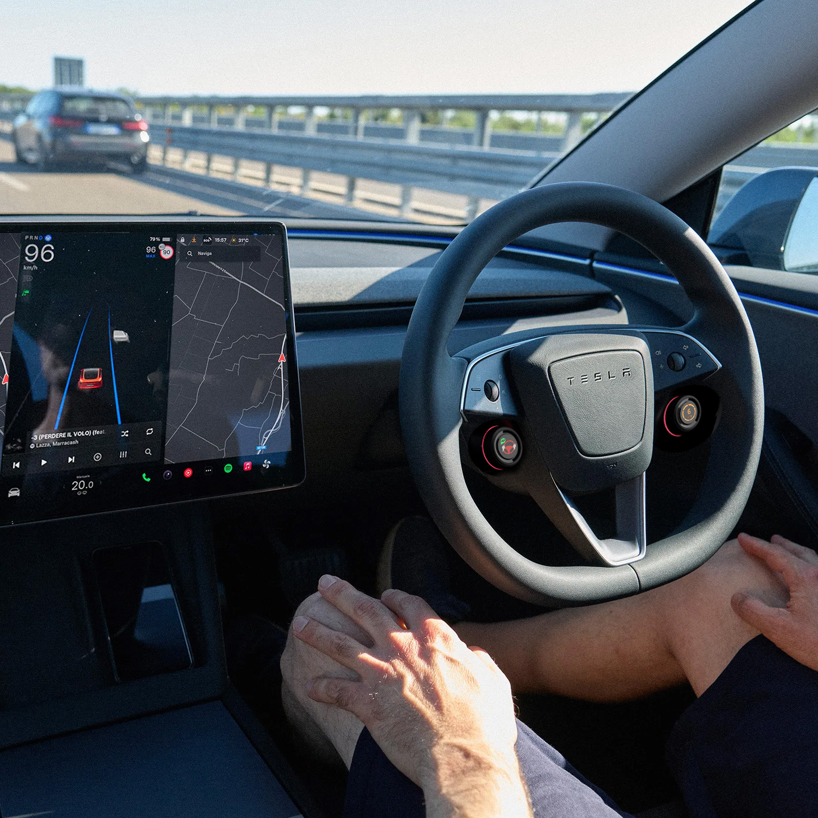 Tesla interior with touchscreen focus